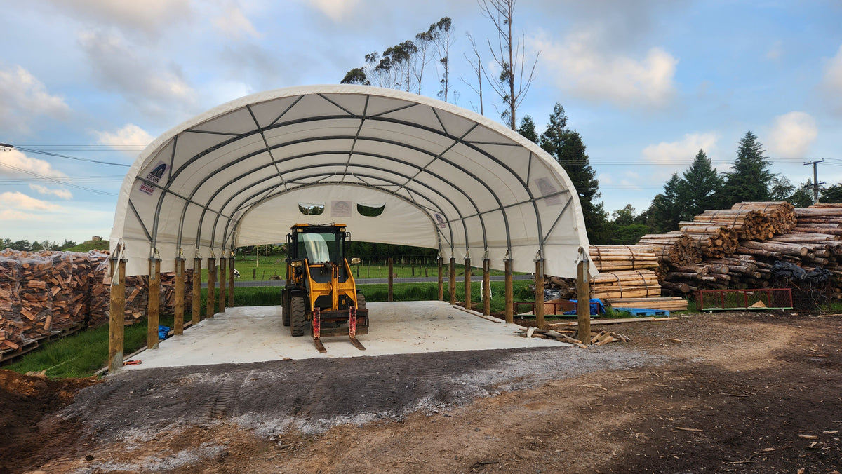 8m x 40ft shelter on posts covering firewood storage