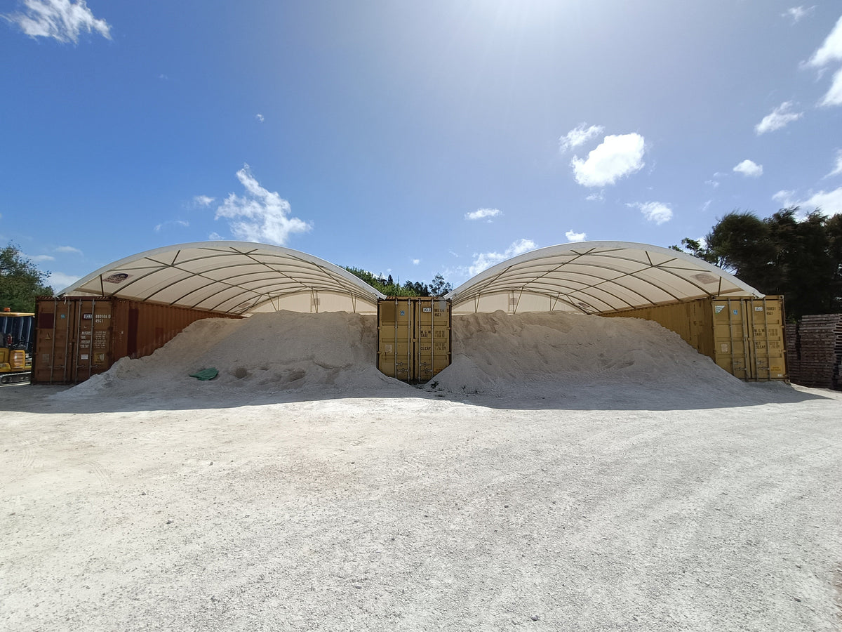 Container shelter over lime storage at a quarry