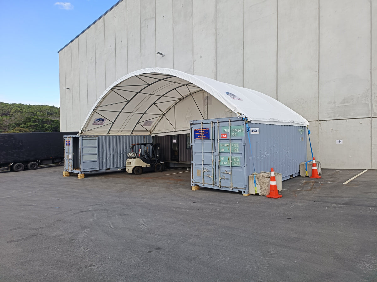 Container shelter with an inside to outside mount at a film studio