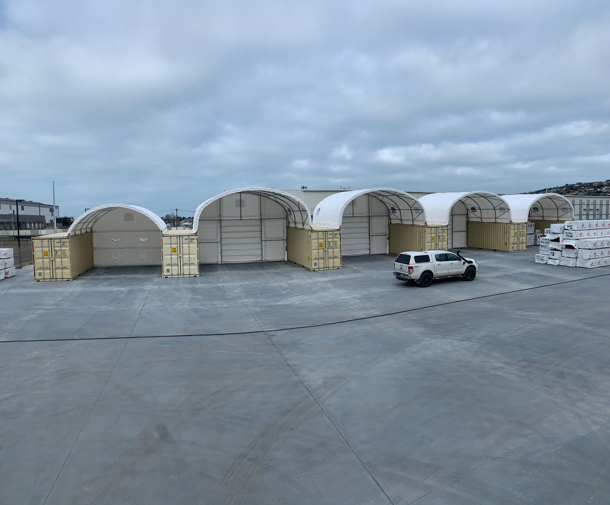 6m and 8m x 20ft shelters sharing containers at a Mitre 10