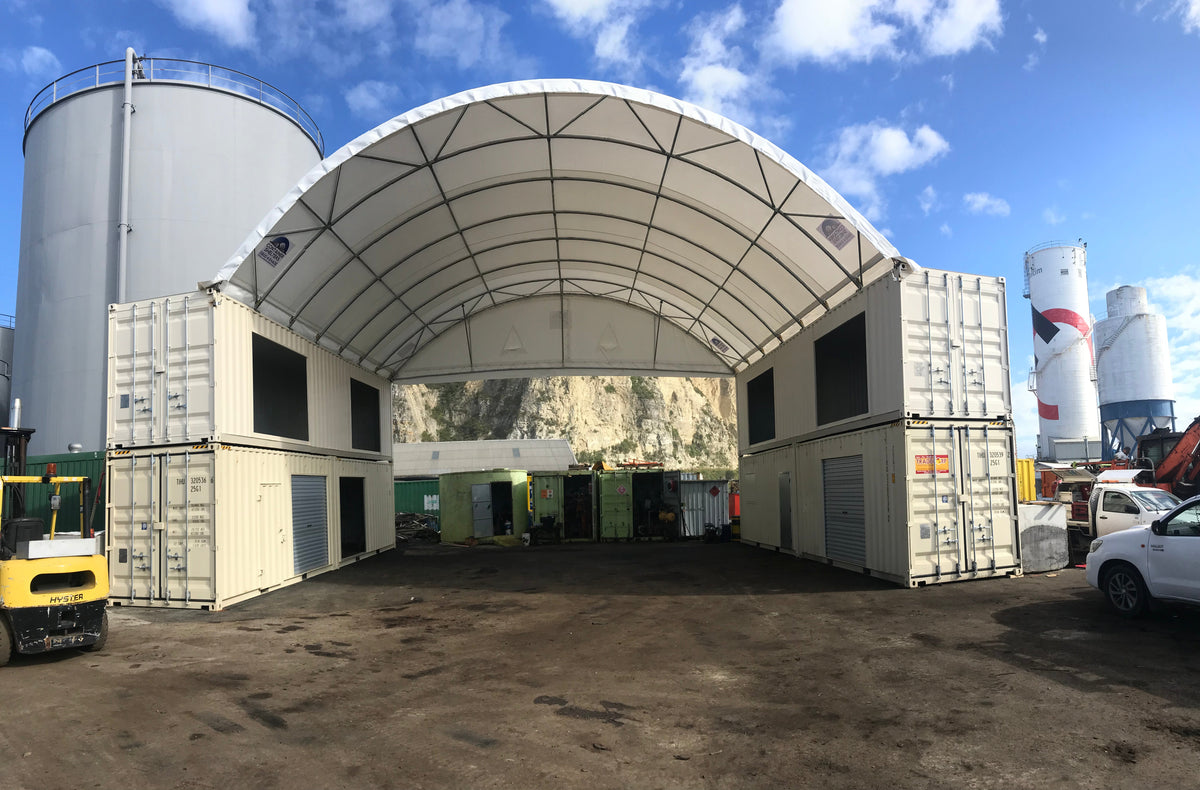 Customised shipping containers supporting a shelter at a port